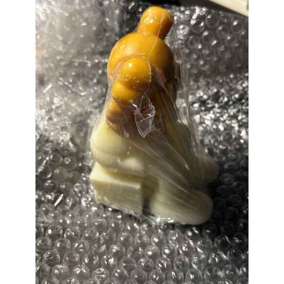 KAWS - (sitting covering face) - Yellow and White CANDLE - Picture 5 of 5